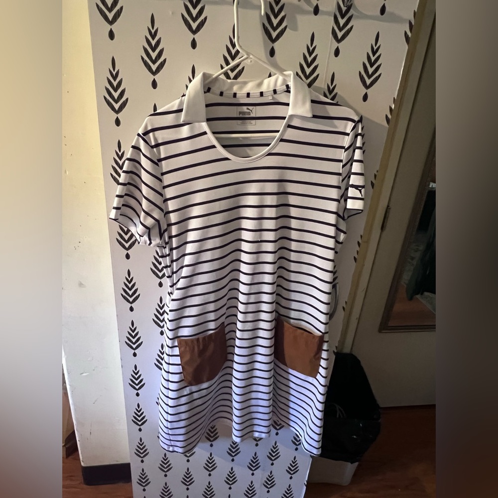 puma golf dress with shorts. XL white with navy blue stripes and brown pockets